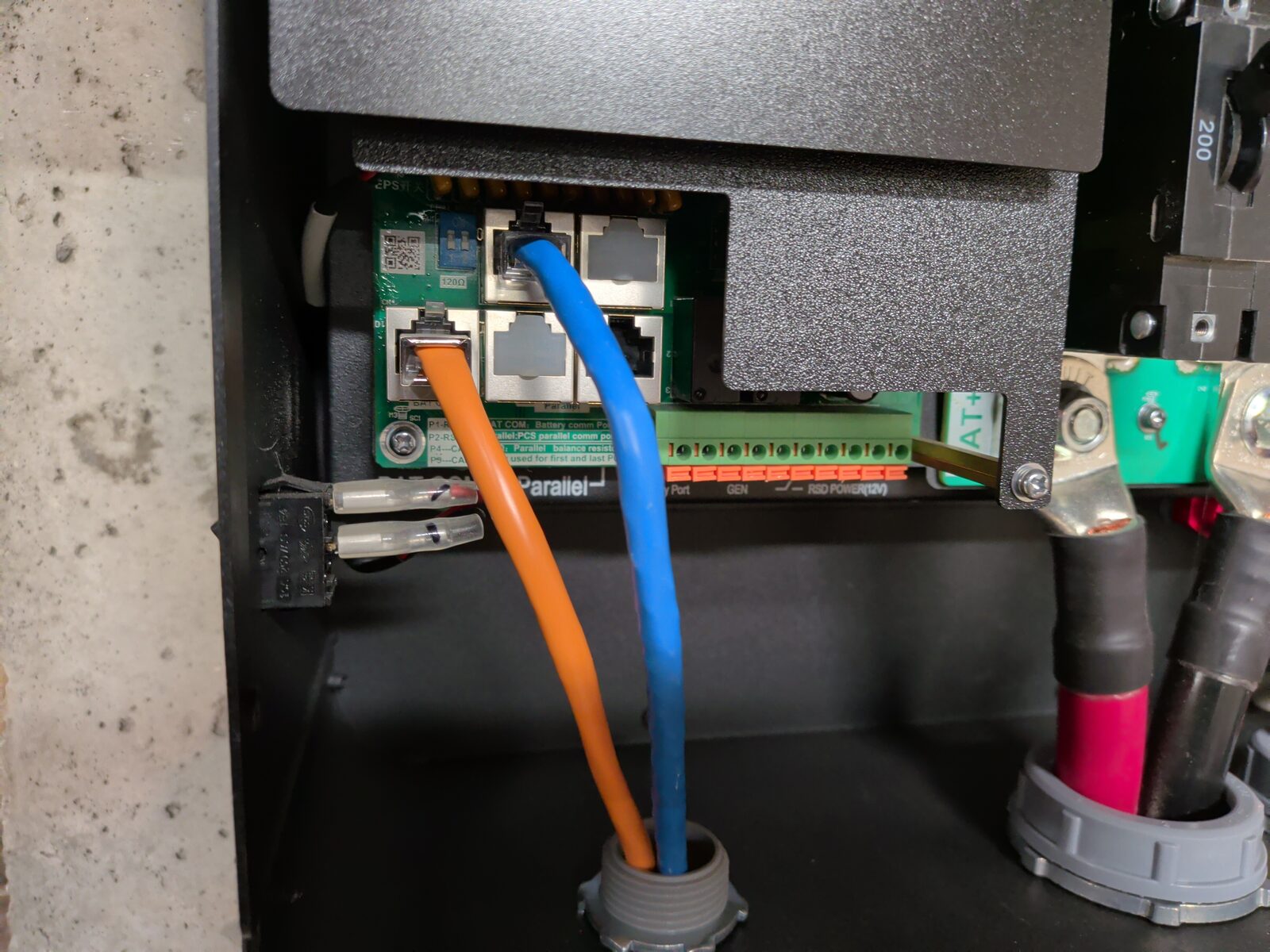 Inverter comms bay with the RS485 cable plugged into the top-left CT1 port