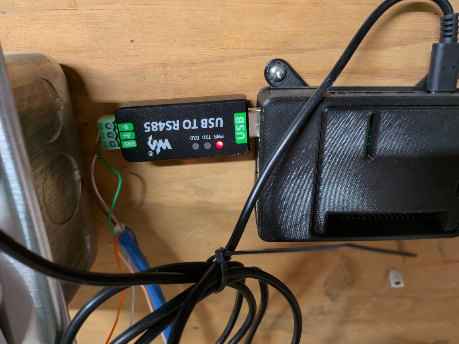 Raspberry Pi mounted on the wall next to the inverter